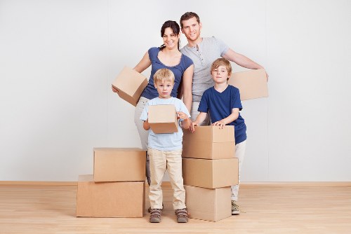 Packed office furniture and boxes ready for a business move