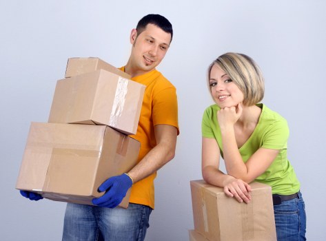Professional movers handling fragile items during a Friern Barnet relocation